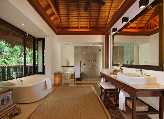 Soaks bathtubs and seagrass carpet appear in bathrooms.