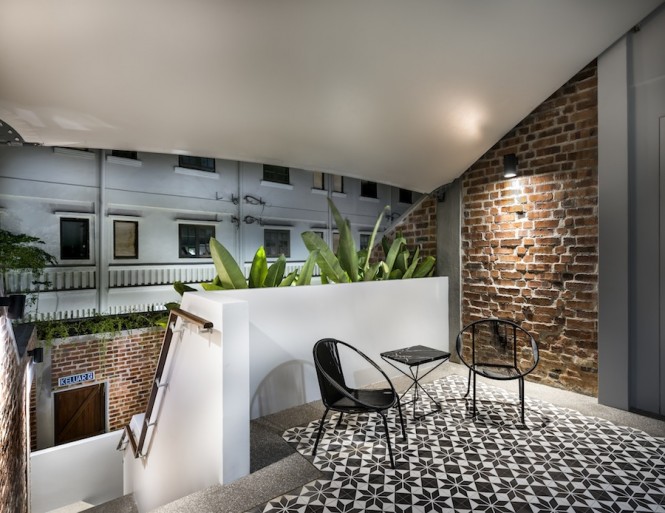 A private back patio preludes each suite.