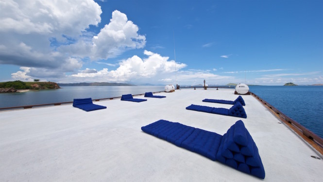 Get a tan or practice yoga on the super yacht's deck.