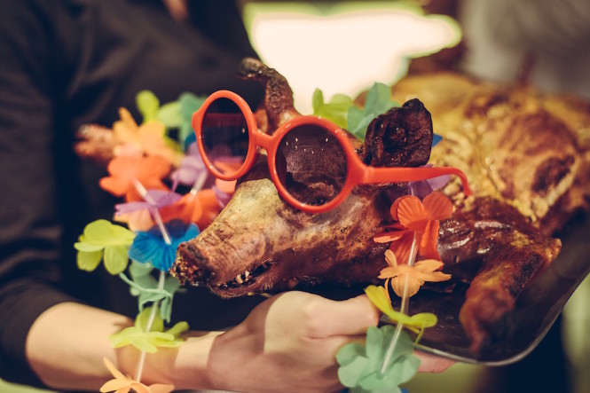 This bespectacled roasted pork was cooked at Don Ho.