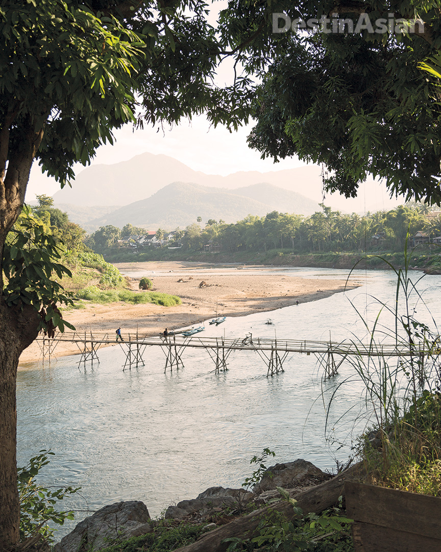 A bamboo footbridge over the Khan River. 