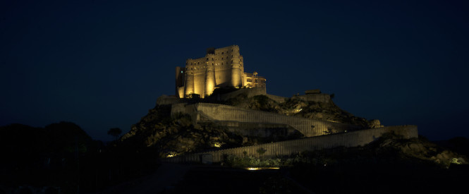 The hotel at night.