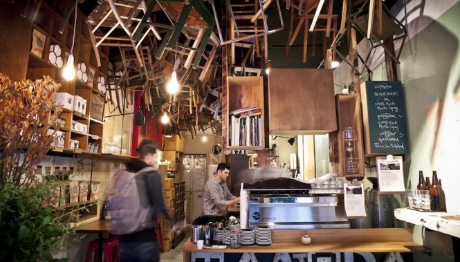 Chairs hang from the ceiling of Brother Baba Budan. Photo by Jennifer Jones