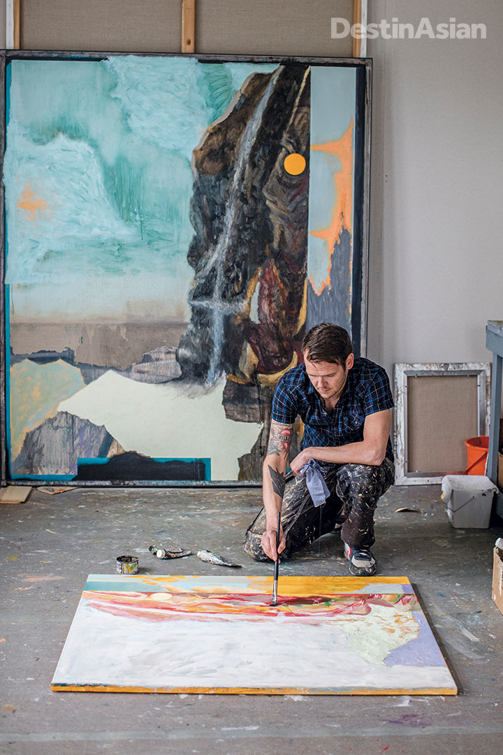 The Lofoten Islands' rugged landscapes have attracted artists--including Trondheim-born painter Thomas Falstad, pictured here at his Lofoten studio--for decades.