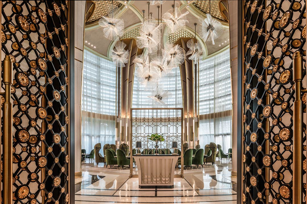 Entering Palm Court, the hotel's richly decorated venue for all-day dining