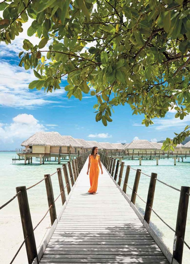 On the jetty connecting Le Taha'a Island to its bamboo-sided Overwater Suites.