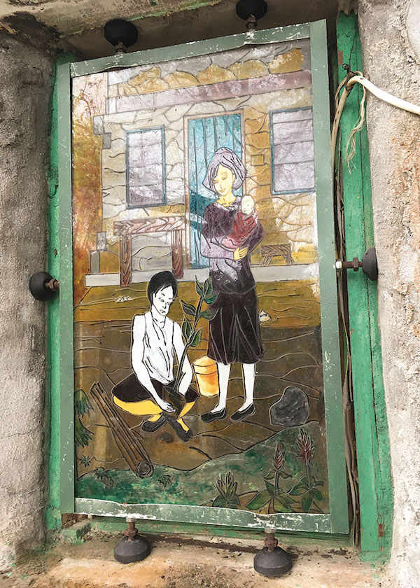 A painted glass window on a village house at Yim Tin Tsai. Photo by the author.