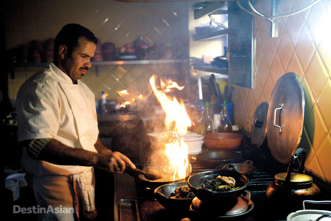 Chef Mustapha Zaizoun in the kitchen at Auberge Dardara. His cooking epitomizes the cuisine of the western Rif in its use of wild herbs, olive oil pressed in tiny stone mills called maâsras, goat meat and fresh goat’smilk cheese, almonds, dried legumes and fruits, and—of course—mushrooms.