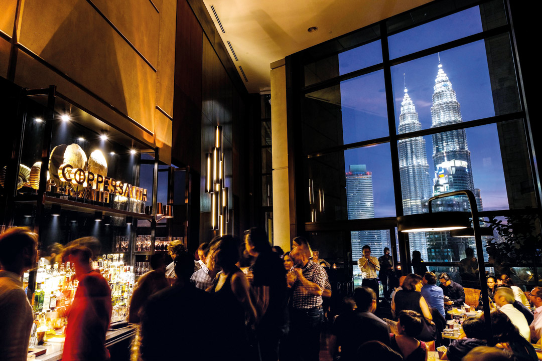 Cocktails at Coppersmith are served with views of the Petronas Twin Towers.