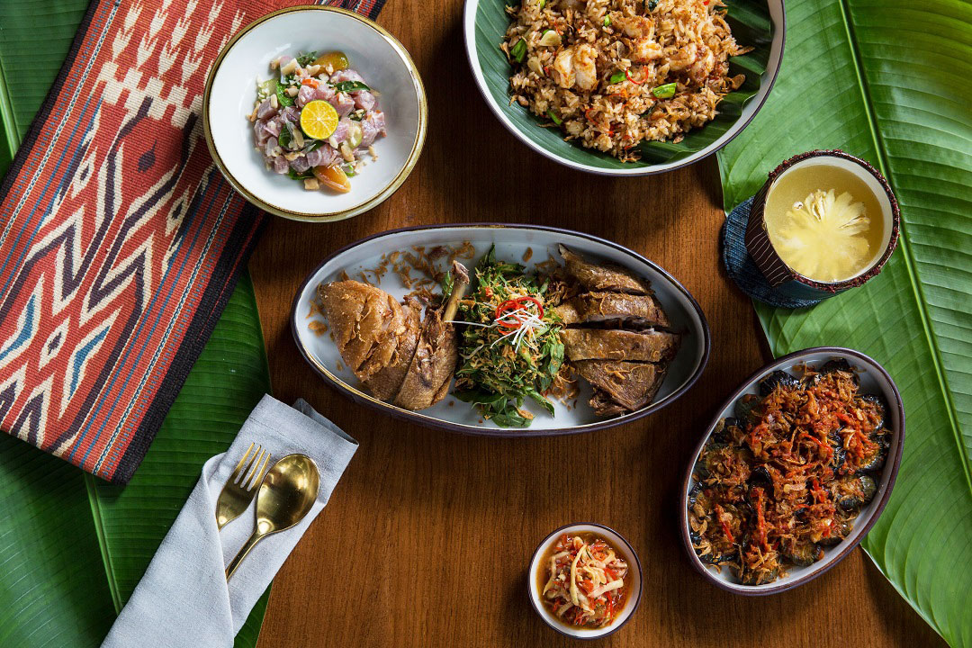 Kaum's menu includes bebek betutu (center) and gohu ikan (top left).