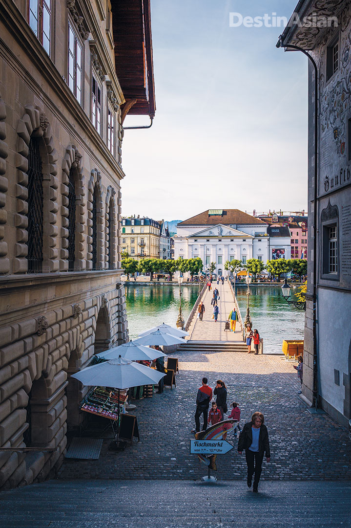 A cobbled passage beside Lucerne's old 17th-century town hall leads down to the Reuss River and the Neustadt ("new city") area beyond. All photos by Lola Akinmade Åkerström. 