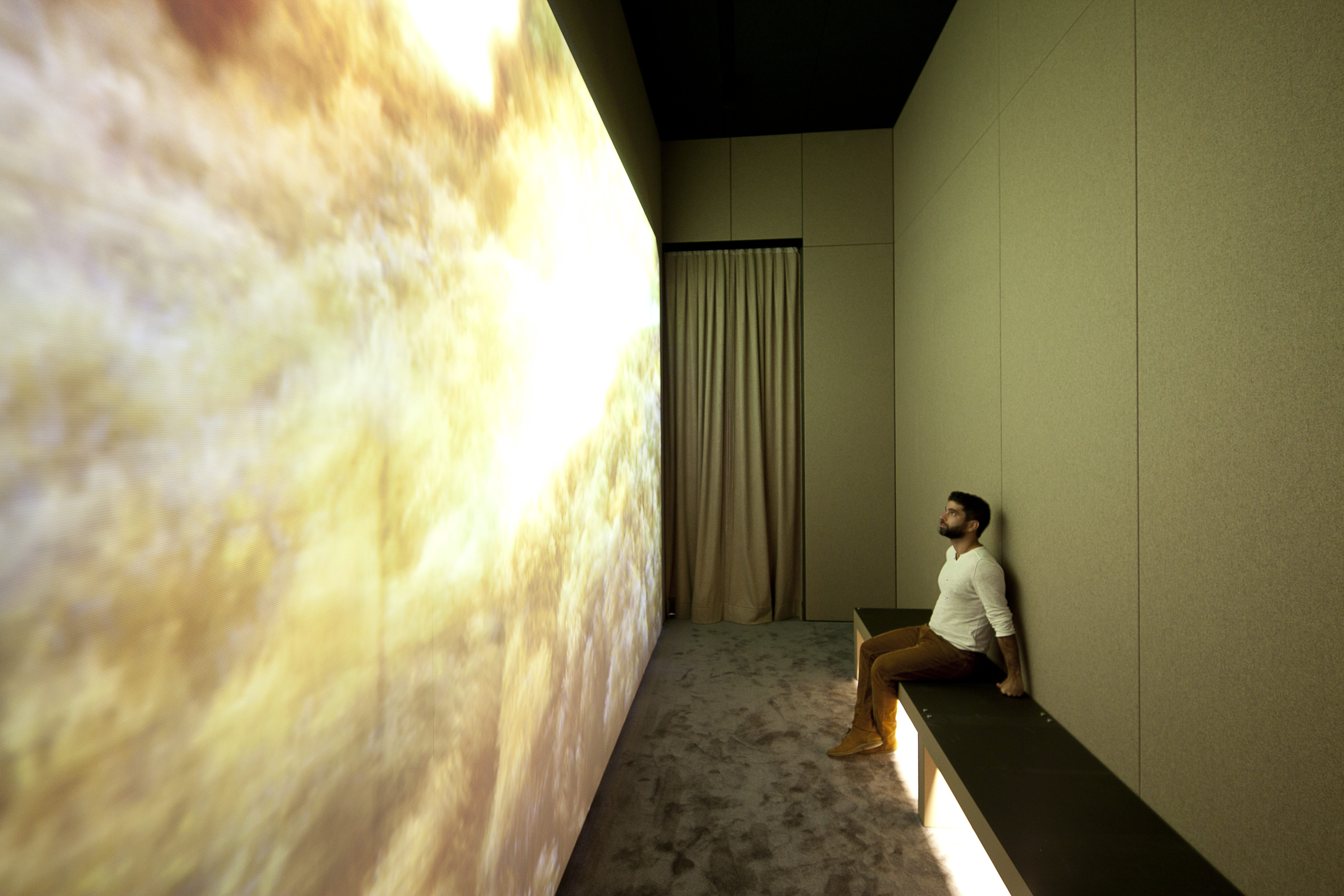 Enjoying the Sound Chamber, a multimedia installation inside MEG's permanent exhibitions. 