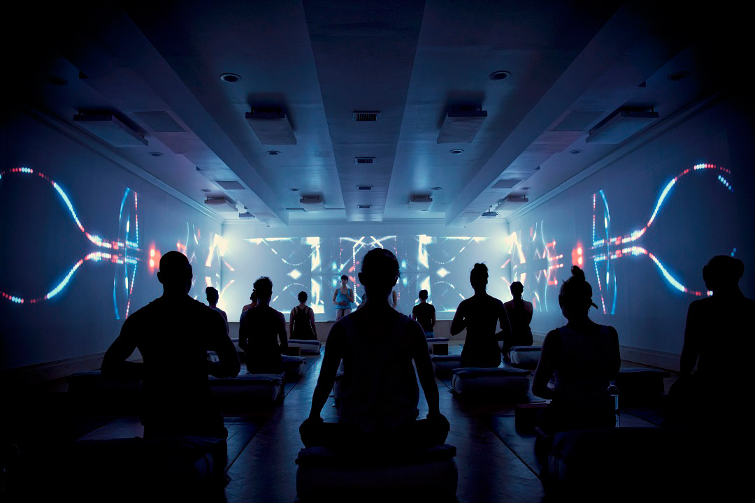 An immersive meditation session at Woom Center.
