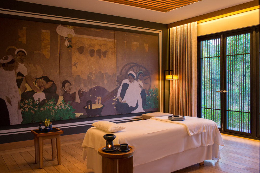 Treatment rooms feature a mural by Vietnamese artist Bui Huu Hung.
