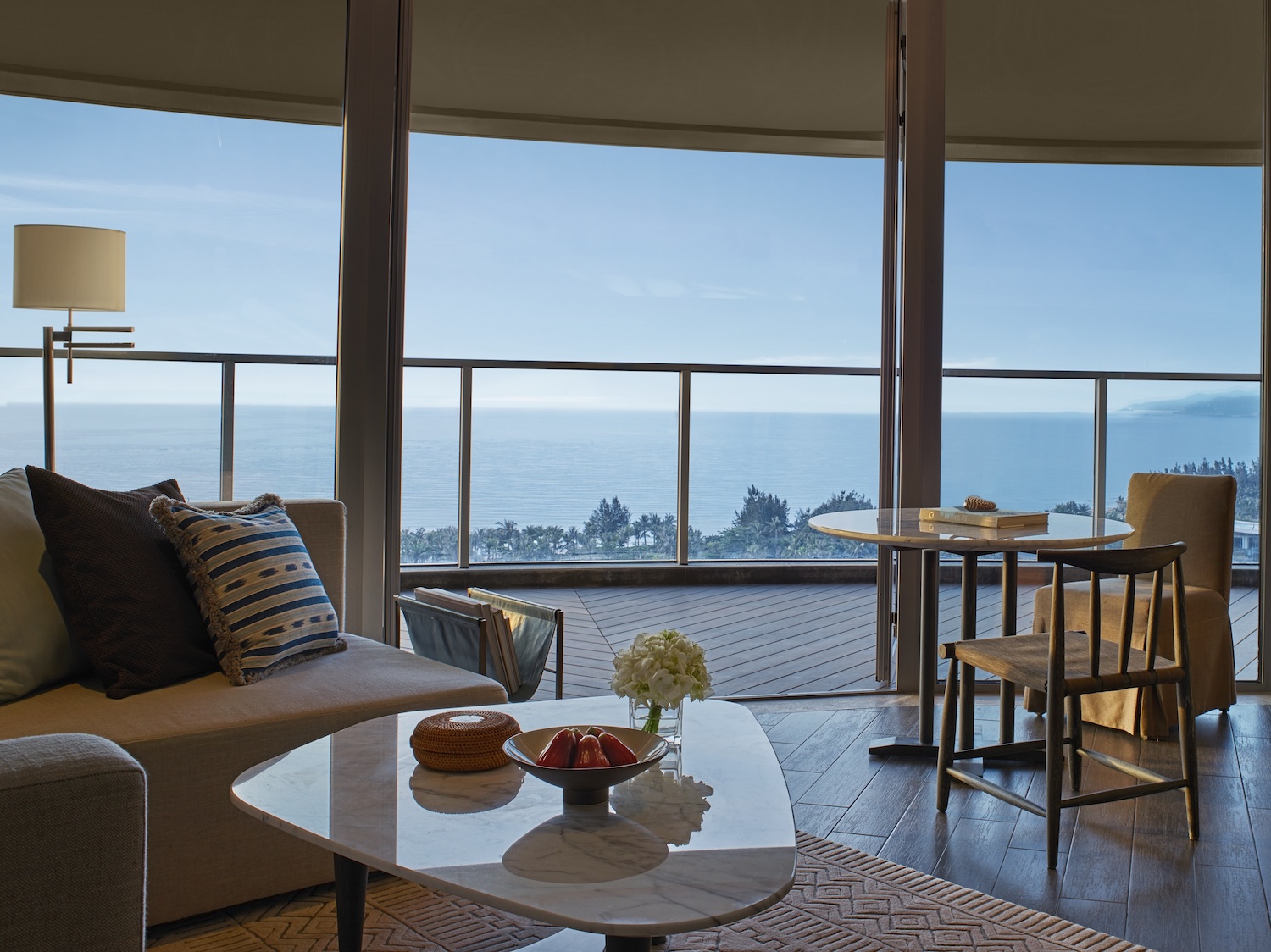 The picturesque living room of the ocean view suite. 