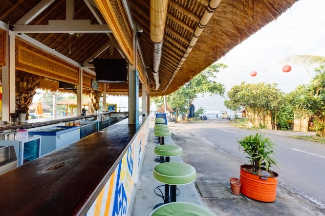Catch views of seasoned surfers from the oceanfront bar.