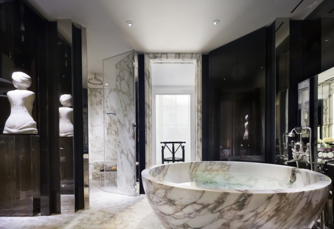 The opulent marble-clad bathrooms of the Manor House Suite.