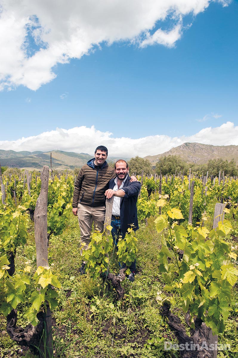 Sommelier Alessandro Pugliese (left) with winemaker Riccardo Negri in Graci’s vineyards on Mount Etna.