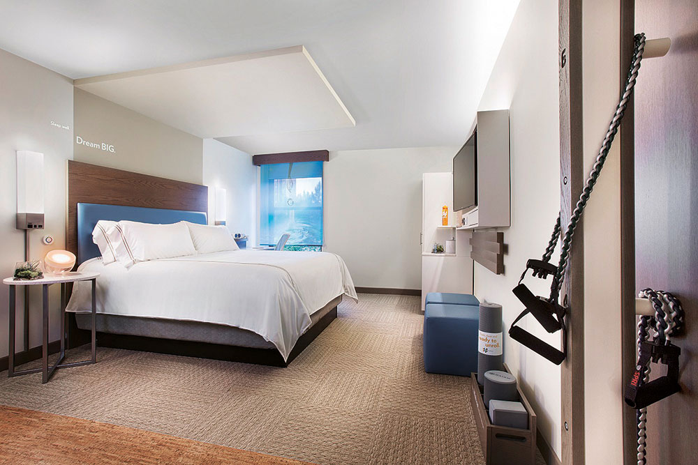 Guest quarters at Even Hotels come with in-room fitness zones.
