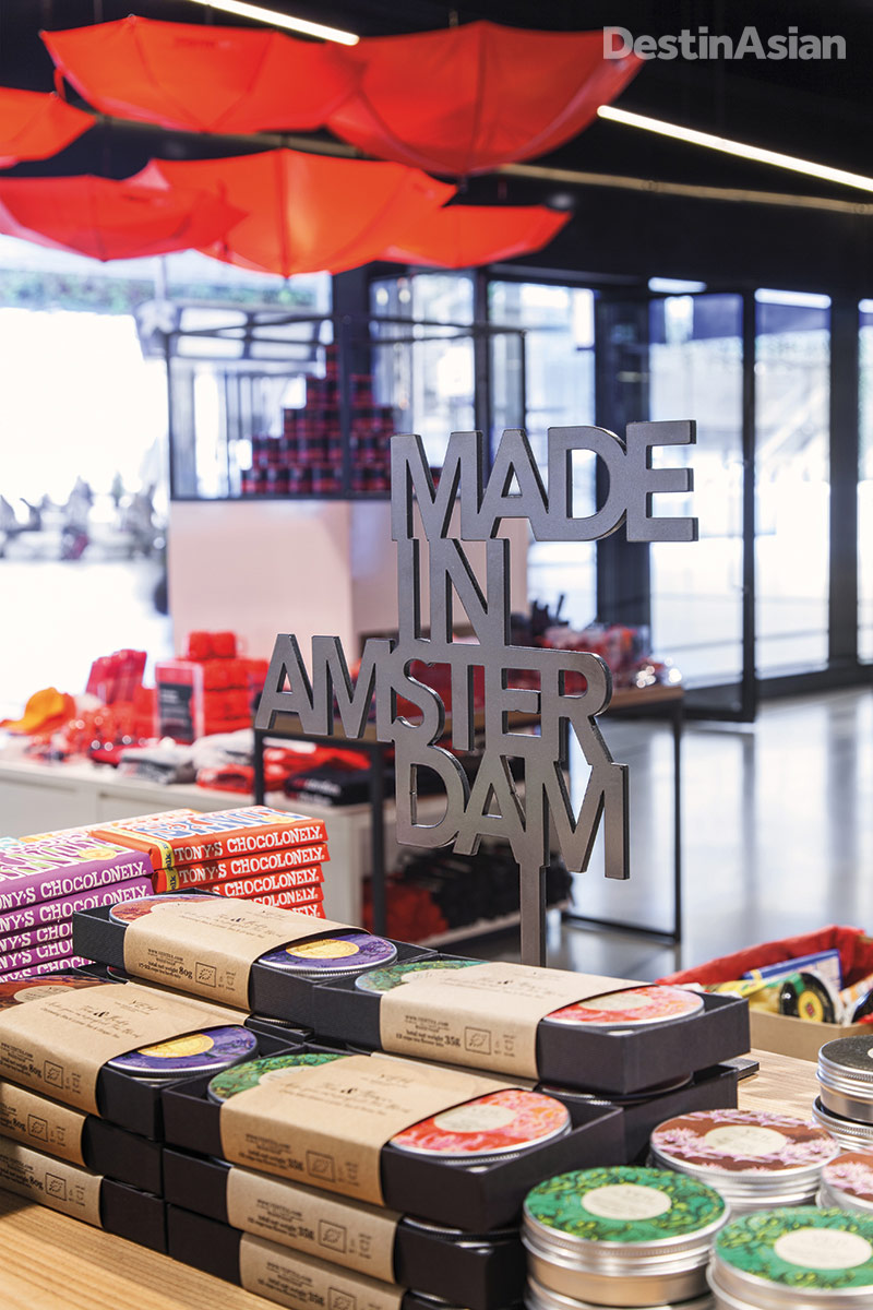 Homegrown brands like Tony's Chocolonely are showcased at I Amsterdam Store.