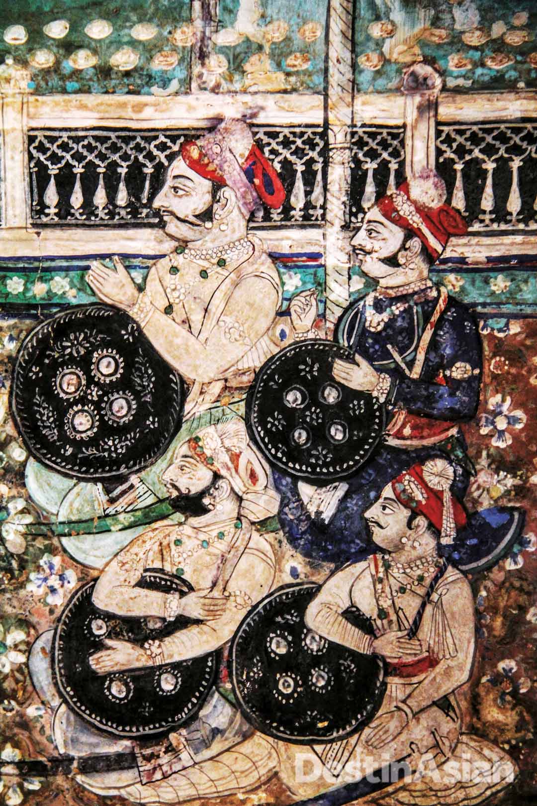 A mural detail in the Chitrashala depicting Rajput warriors during an audience with their raja.