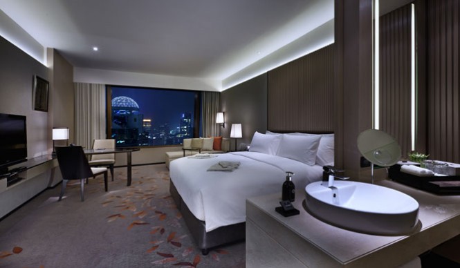 A room at night at the Okura Prestige Bangkok hotel.