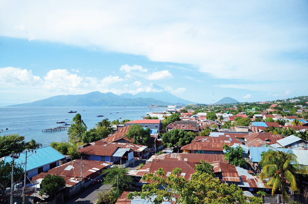 Ternate’s bustling town and the neighboring island of Tidore as seen from Fort Tolukko.