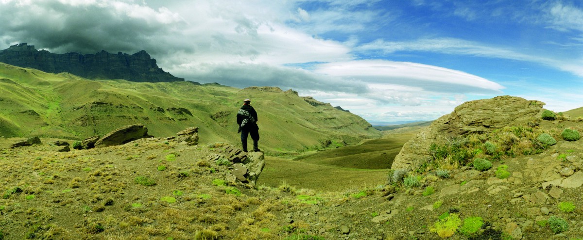A Chilean cowboy surveying valley of the Rio Baguales.