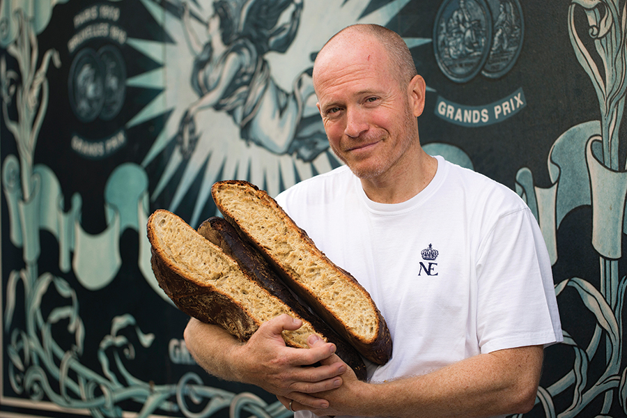 Du Pain et des Idees' Christophe Vasseur with loaves of his signature friendship bread.
