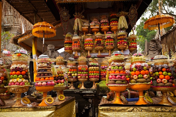 An array of fruits sit as an offering meant to appease Balinese spirits.