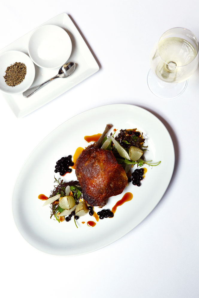The nouvelle Californian cuisine at Spruce includes this crispy duck confit with huckleberries and salsify in smoked-honey jus.