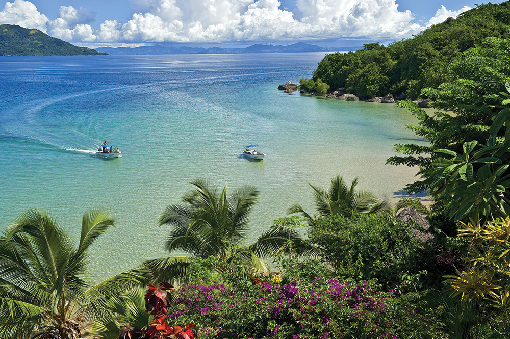 A short speedboat ride from Nosy Be, Tsara Komba Lodge fronts a picture-perfect cove.