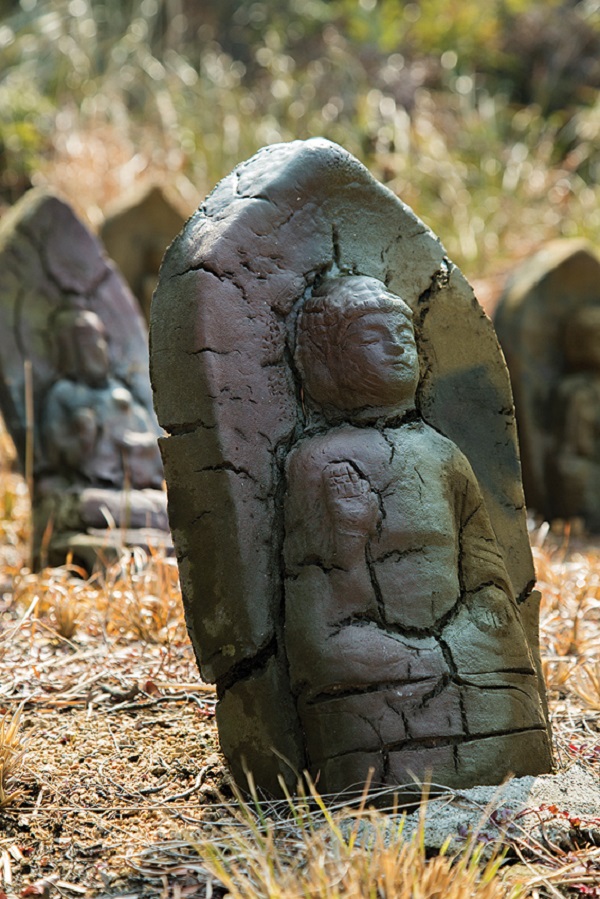 Just some of the Buddha statues comprising Tsuyoshi Ozawa's 