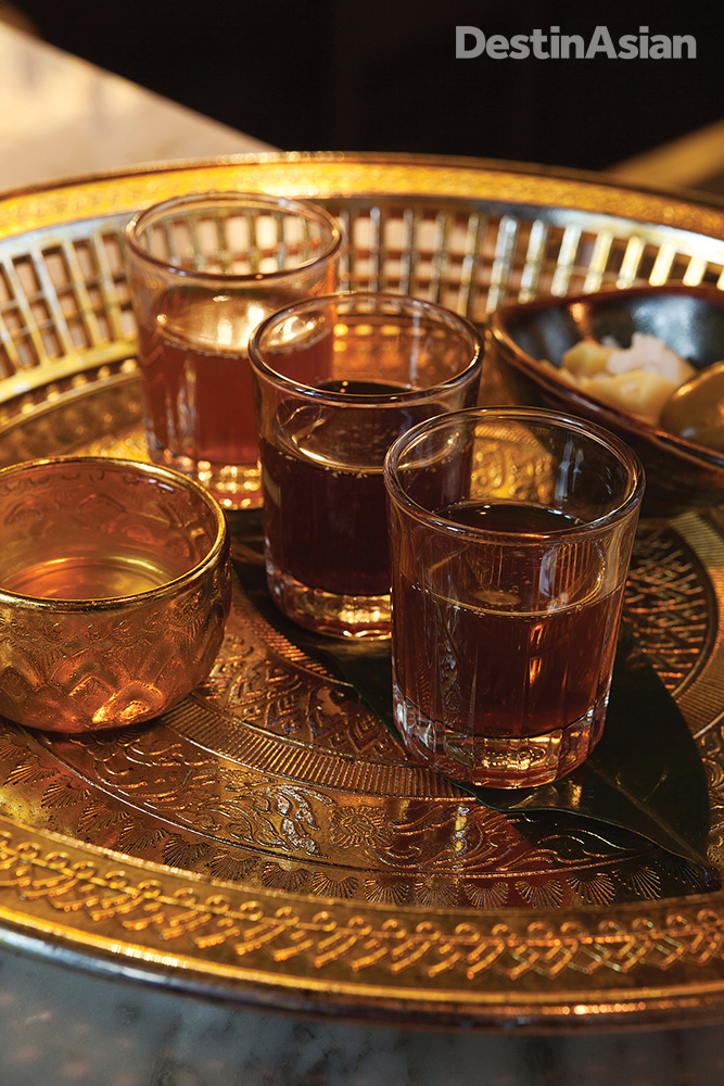 A selection of Tep Bar's signature yadong (Thai rice whiskey) infusions.