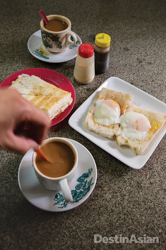 A breakfast of white coffee with kaya toast and soft-boiled eggs at Sin Yoon Loong.