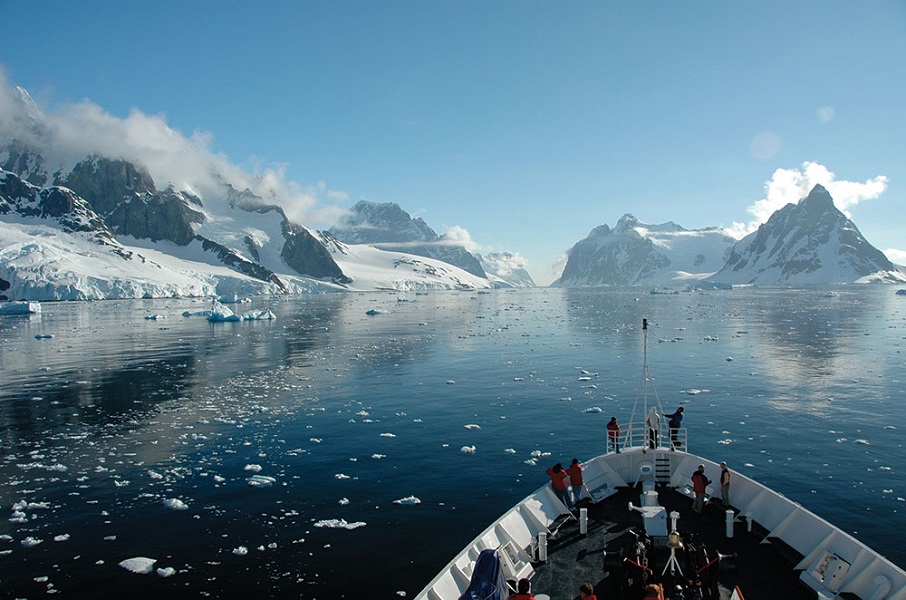 Passengers aboard Le Boréal take in the wild beauty of the Antarctic Peninsula’s Lemaire Channel.