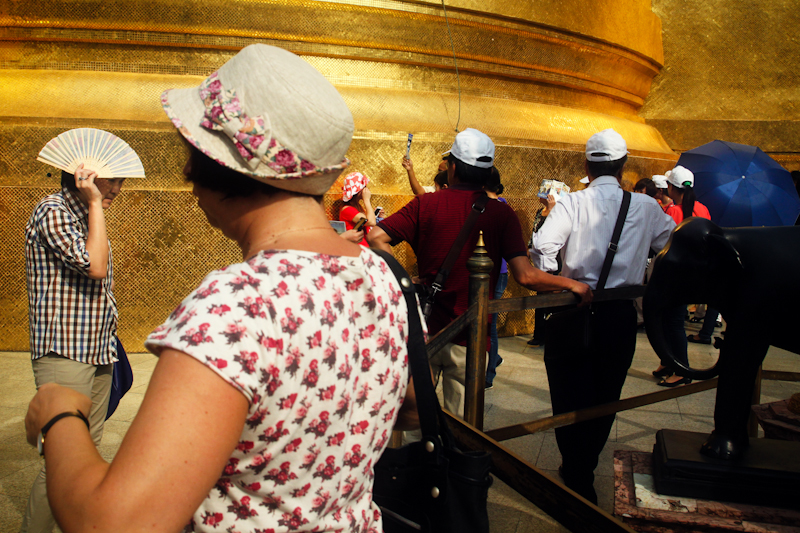 Tourists flock to Bangkok's many temples.