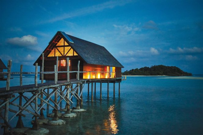 An overwater bungalow at Bawah Reserve, a private-island resort in the Riau Archipelago.