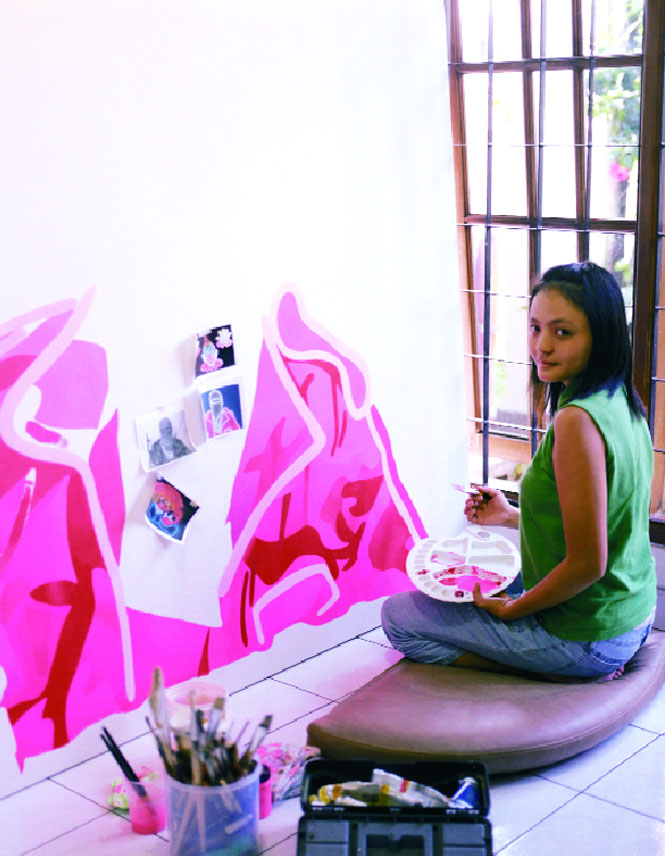 Beatrix Hendriani at work in her studio-cum-bedroom in Bandung.