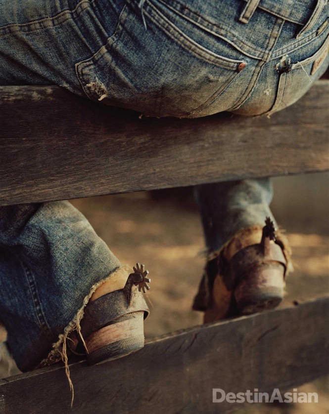 A ranch hand shows his spurs