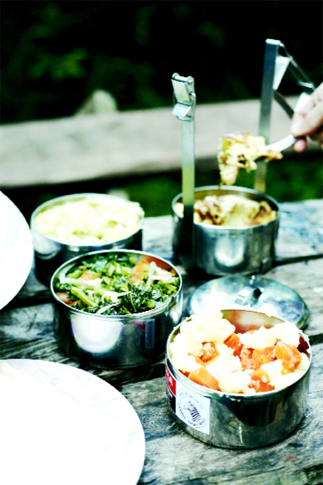 Camp meals revolve around Lao dishes like fried pork and garlic-scented vegetables.