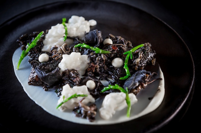 Confit squid & chorizo paella is part of the new Sea menu.