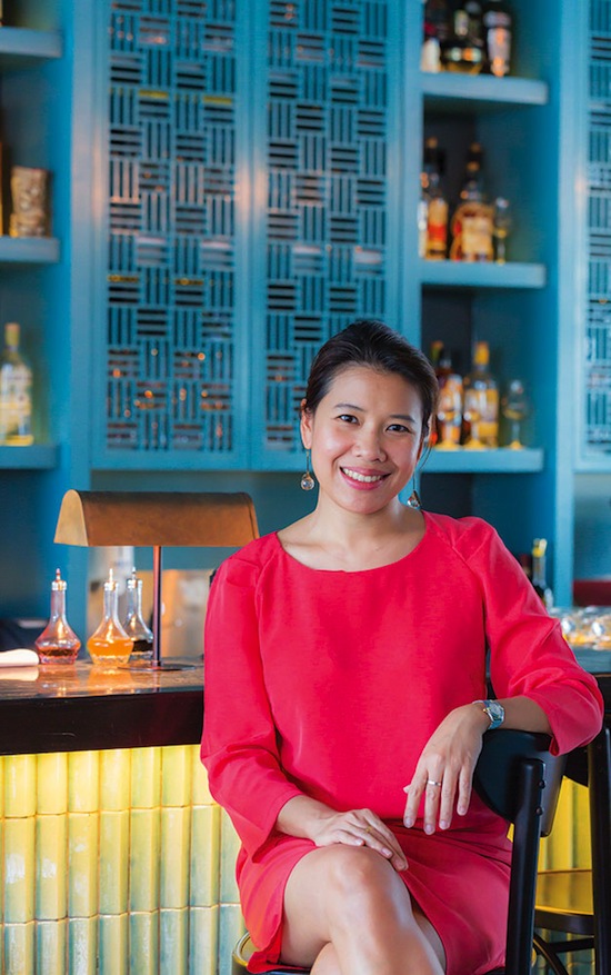 Chanida Nickie Sangngampal at the bar of her Longtail Asian Brasserie, one of the many restaurants that have opened on Marina Bay alongside the area's ambitious urban transformation.