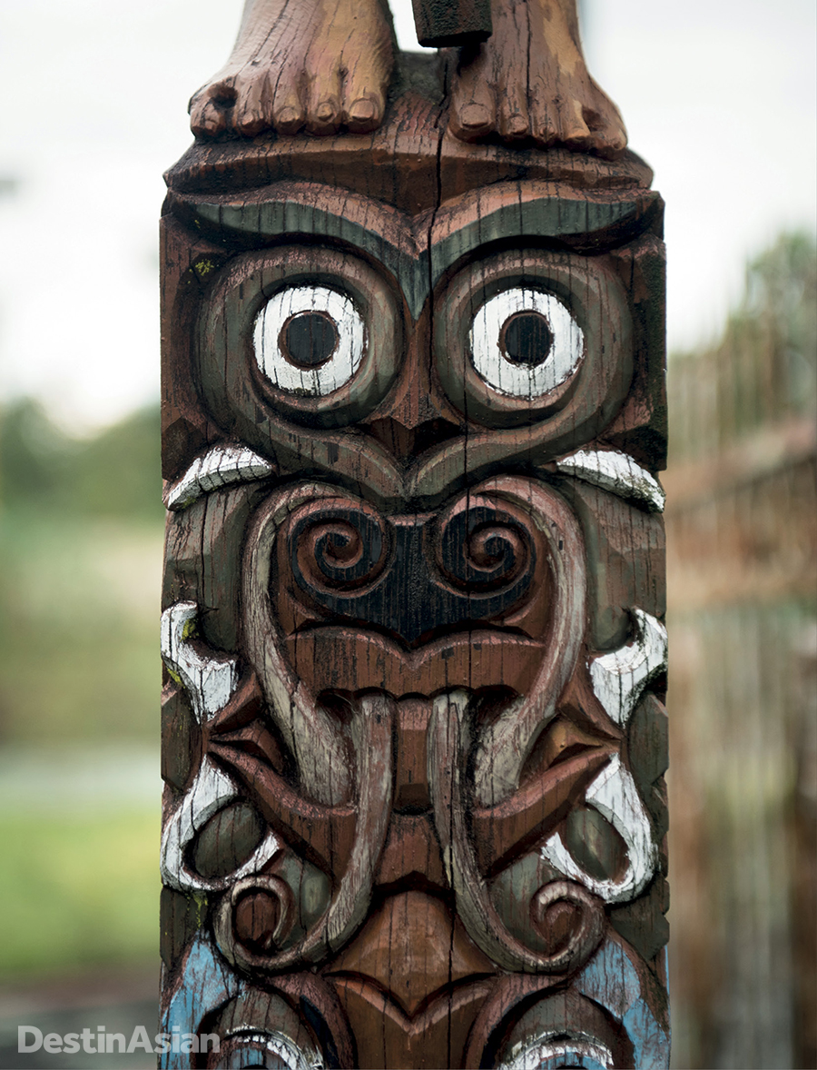 A painted ornament marks a sandung, or bone house, in a Dayak village.