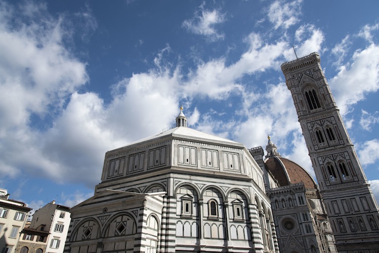 The decorative, colorful marble facade is a defining feature of the Duomo.
