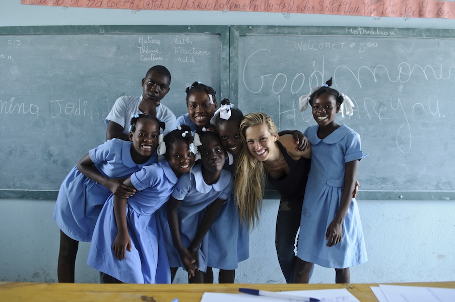 Petra Nemcova with students at one of the seven schools in Haiti she helped rebuild following the 2010 earthquake.