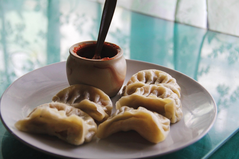 Momo dumplings with spicy chutney make for a local lunch.
