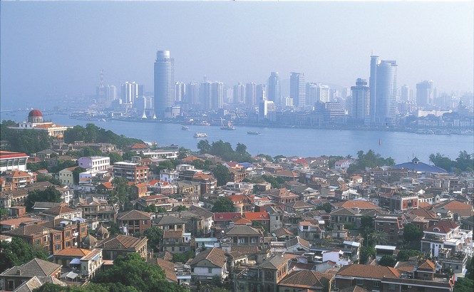 Looking east across the old rooftops of Gulangyu to high-rise Xiamen
