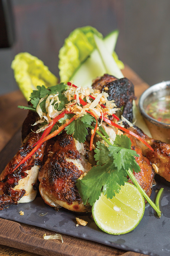 Thai-style wood-roasted chicken marinated in garlic, coriander root, and black pepper.