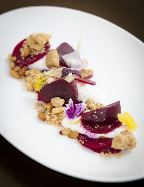 Marinated beetroot salad with honeycomb burrata and pinenuts by Chef Andrew Walsh.
